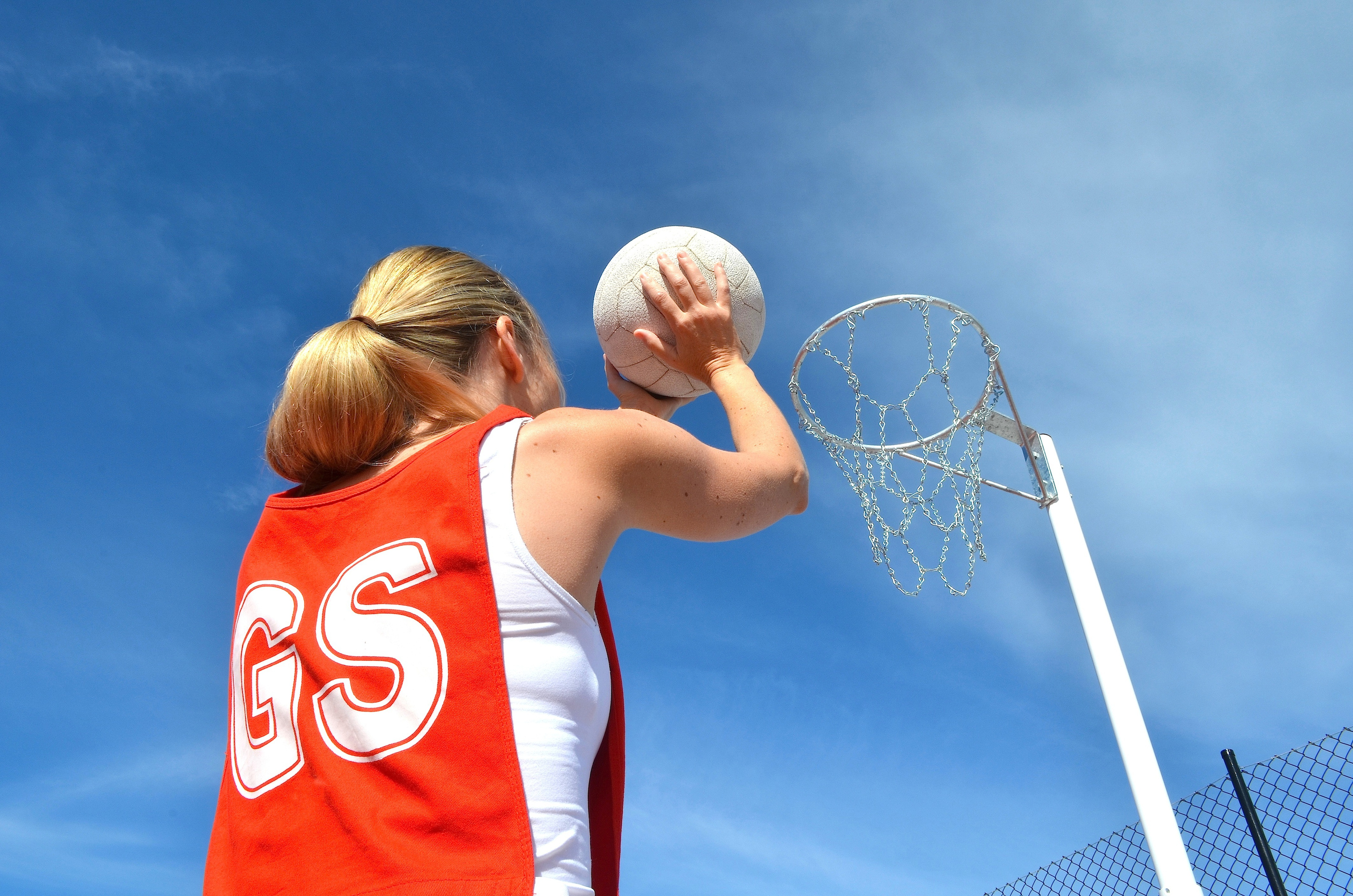 Taking a shot at goal in netball